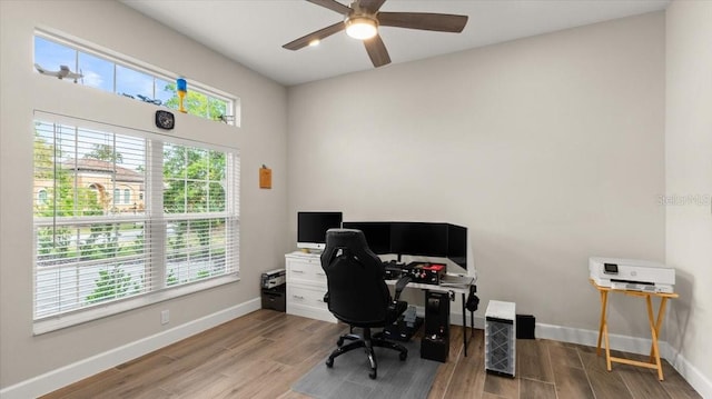 29 Old Oak Dr S, Palm Coast, FL 32137 - office area with baseboards, wood finished floors, and a ceiling fan