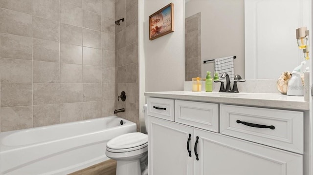 29 Old Oak Dr S, Palm Coast, FL 32137 - full bathroom with toilet, wood finished floors, vanity, and washtub / shower combination