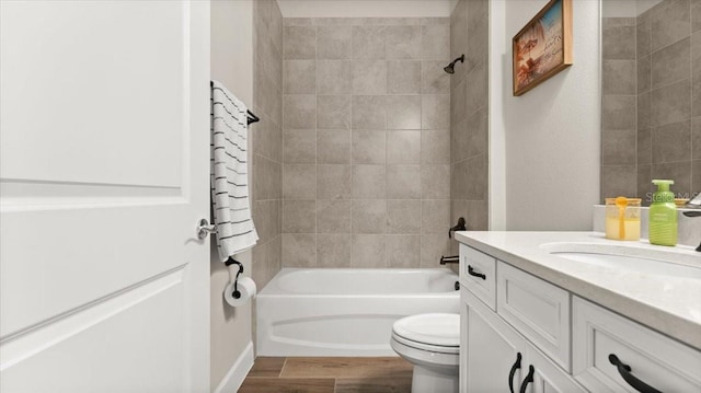 29 Old Oak Dr S, Palm Coast, FL 32137 - full bathroom featuring toilet, wood finished floors, vanity, and shower / bathtub combination