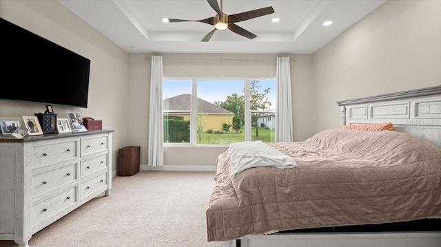 29 Old Oak Dr S, Palm Coast, FL 32137 - bedroom with a tray ceiling, light colored carpet, baseboards, and recessed lighting