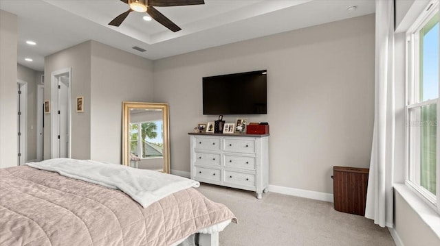 29 Old Oak Dr S, Palm Coast, FL 32137 - bedroom with baseboards, recessed lighting, a ceiling fan, light carpet, and a tray ceiling