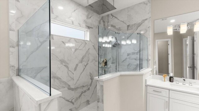 29 Old Oak Dr S, Palm Coast, FL 32137 - full bathroom featuring a marble finish shower and vanity