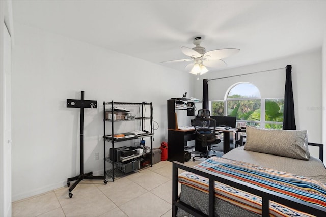 bedroom with light tile patterned flooring and a ceiling fan