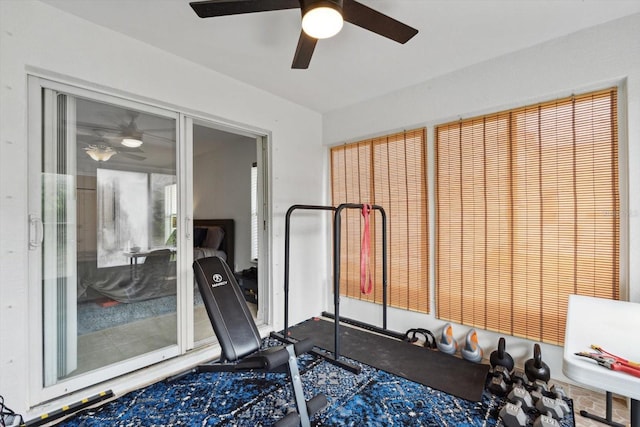 workout area with ceiling fan