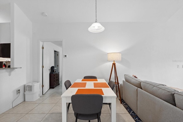 dining room with light tile patterned flooring