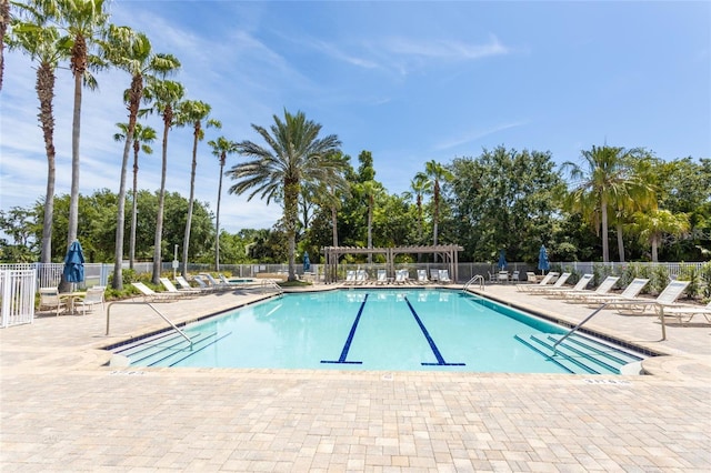 45 Riverview Bnd S Unit 1937, Palm Coast, FL 32137 - community pool with fence, a patio area, and a pergola