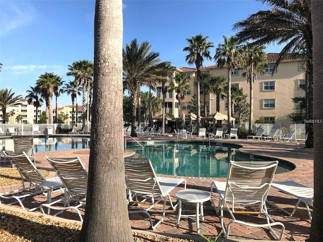 45 Riverview Bnd S Unit 1937, Palm Coast, FL 32137 - community pool with fence and a patio area