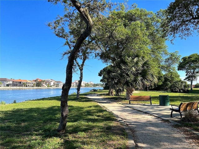 45 Riverview Bnd S Unit 1937, Palm Coast, FL 32137 - surrounding community featuring a lawn and a water view