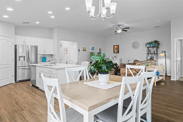 324 Palace Dr, Saint Augustine, FL 32084 - dining room with ceiling fan, wood finished floors, recessed lighting, and a chandelier