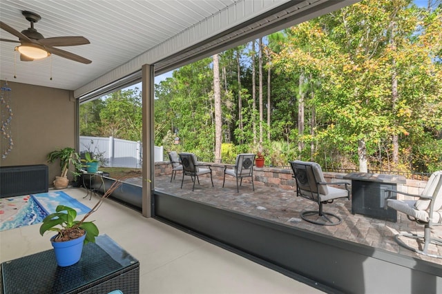 324 Palace Dr, Saint Augustine, FL 32084 - sunroom / solarium featuring a fire pit and ceiling fan