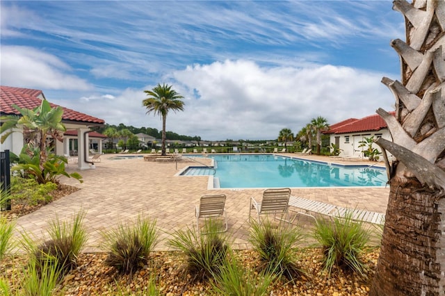 324 Palace Dr, Saint Augustine, FL 32084 - community pool featuring a patio and a jacuzzi
