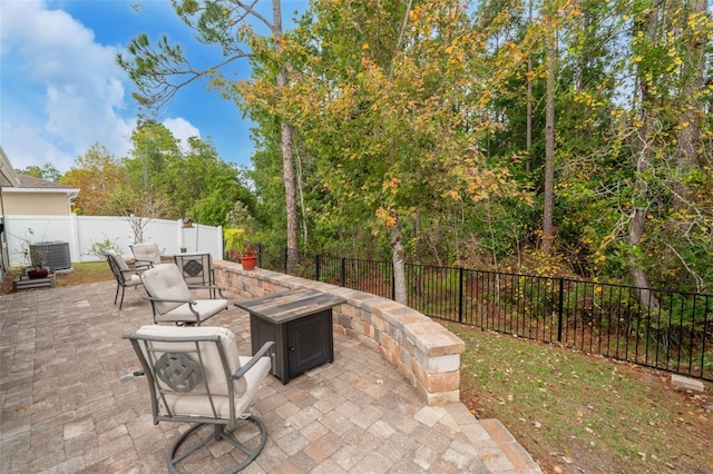 324 Palace Dr, Saint Augustine, FL 32084 - fenced backyard with a fire pit and a patio