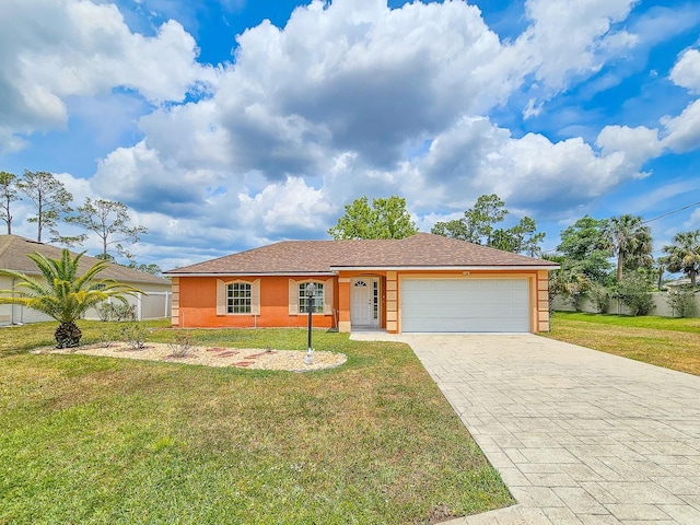18 Wheatfield Dr, Palm Coast, FL 32164 - ranch-style home featuring a garage, a front lawn, decorative driveway, and stucco siding