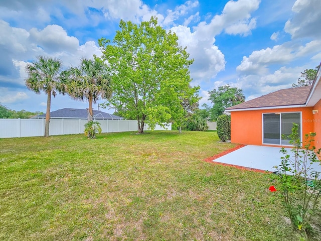 18 Wheatfield Dr, Palm Coast, FL 32164 - view of yard featuring a patio