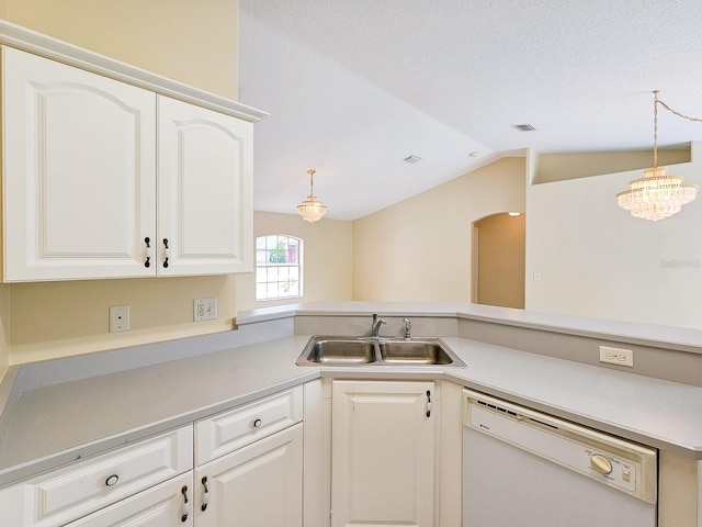 18 Wheatfield Dr, Palm Coast, FL 32164 - kitchen with dishwasher, a sink, vaulted ceiling, decorative light fixtures, and light countertops