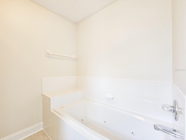 18 Wheatfield Dr, Palm Coast, FL 32164 - full bath featuring a jetted tub and baseboards