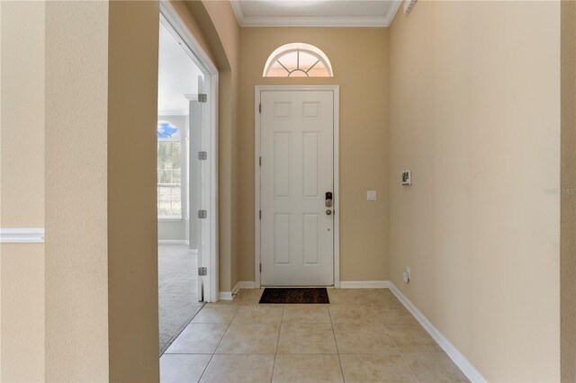 4484 Gray Hawk St, Orange Park, FL 32065 - entrance foyer featuring baseboards, ornamental molding, and light tile patterned floors