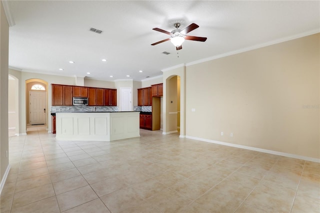 4484 Gray Hawk St, Orange Park, FL 32065 - unfurnished living room with ornamental molding, a ceiling fan, arched walkways, and visible vents