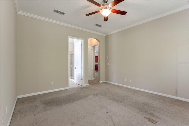 4484 Gray Hawk St, Orange Park, FL 32065 - unfurnished room with visible vents, crown molding, arched walkways, and a ceiling fan