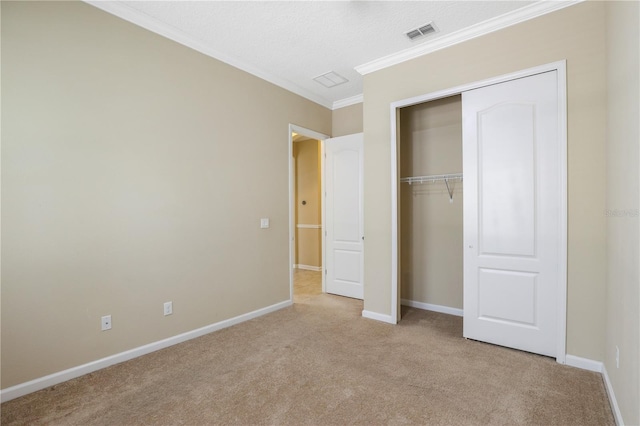 4484 Gray Hawk St, Orange Park, FL 32065 - unfurnished bedroom with a closet, crown molding, carpet flooring, baseboards, and visible vents