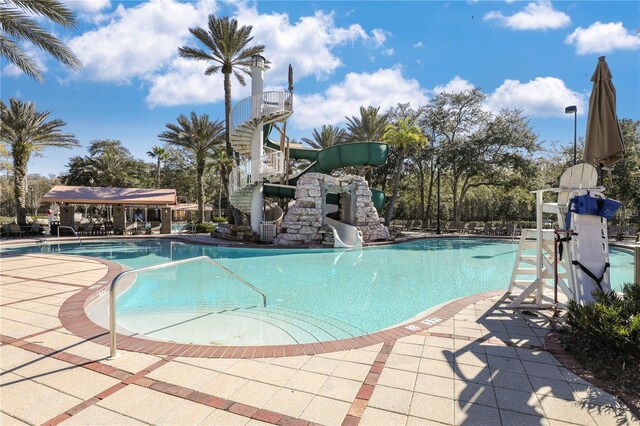 4484 Gray Hawk St, Orange Park, FL 32065 - pool with a water slide, stairs, and a patio area