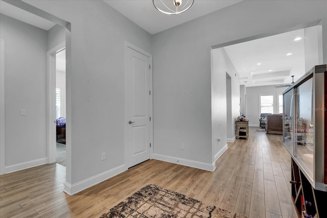 entrance foyer featuring recessed lighting, light wood finished floors, and baseboards