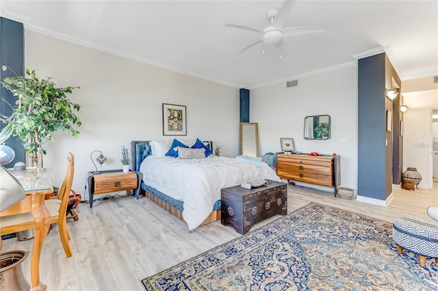 925 N Halifax Ave Unit 1105, Daytona Beach, FL 32118 - bedroom with light wood-style flooring, visible vents, crown molding, and baseboards