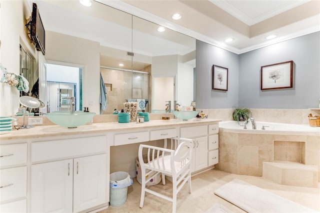 925 N Halifax Ave Unit 1105, Daytona Beach, FL 32118 - full bathroom featuring crown molding, a sink, a stall shower, a bath, and double vanity