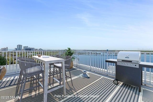 925 N Halifax Ave Unit 1105, Daytona Beach, FL 32118 - exterior space featuring area for grilling and a water view