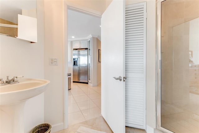925 N Halifax Ave Unit 1105, Daytona Beach, FL 32118 - bathroom with a shower stall, a sink, baseboards, tile patterned flooring, and recessed lighting