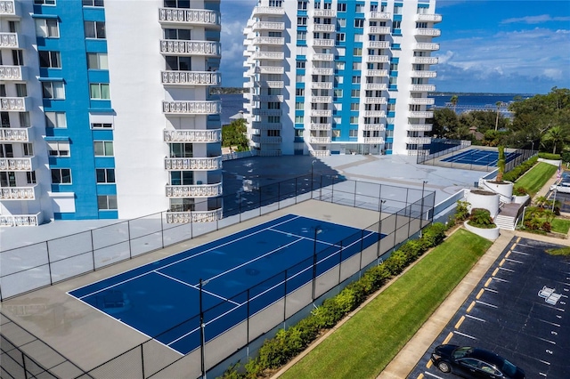 925 N Halifax Ave Unit 1105, Daytona Beach, FL 32118 - view of tennis court with fence