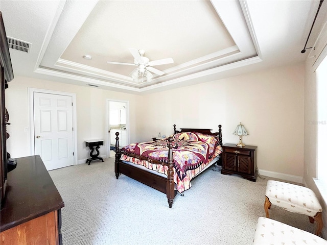 161 Frontier Dr, Palm Coast, FL 32137 - bedroom featuring a tray ceiling, visible vents, and ceiling fan