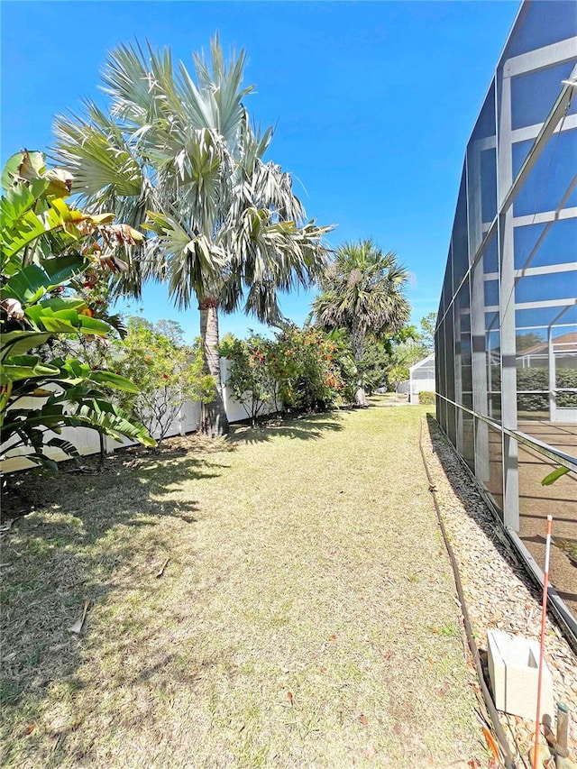 161 Frontier Dr, Palm Coast, FL 32137 - view of yard featuring a lanai