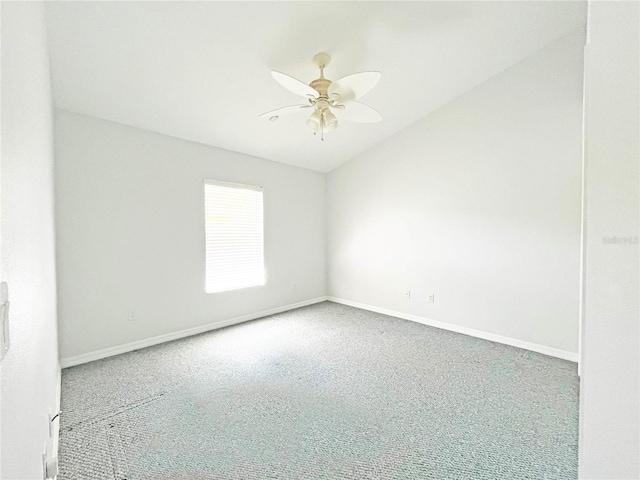 161 Frontier Dr, Palm Coast, FL 32137 - empty room featuring baseboards, lofted ceiling, ceiling fan, and carpet