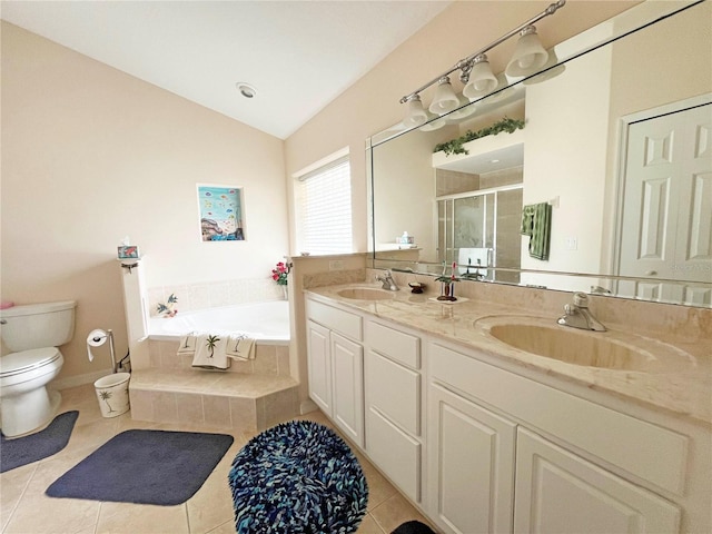 161 Frontier Dr, Palm Coast, FL 32137 - bathroom featuring a stall shower, tile patterned floors, a sink, and a garden tub