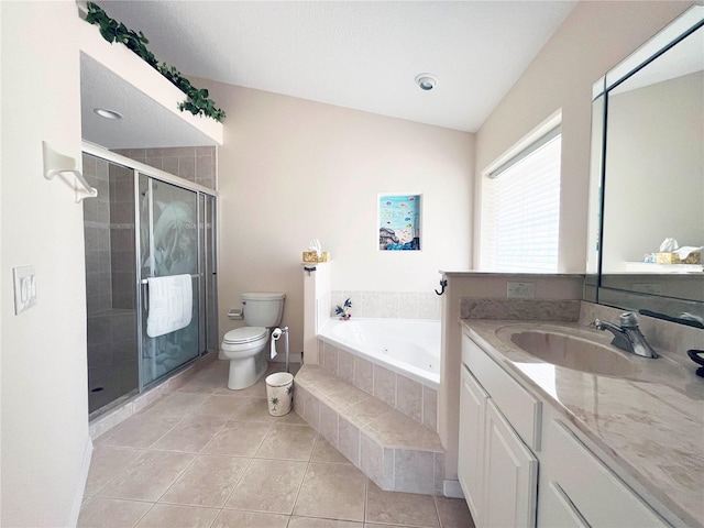 161 Frontier Dr, Palm Coast, FL 32137 - bathroom featuring toilet, a whirlpool tub, vanity, a stall shower, and tile patterned floors
