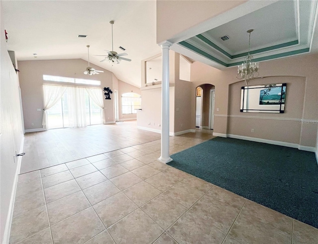 161 Frontier Dr, Palm Coast, FL 32137 - unfurnished living room featuring ceiling fan, arched walkways, tile patterned flooring, lofted ceiling, and a chandelier