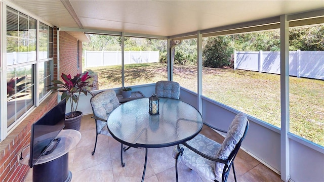 73 Royal Oak Dr, Palm Coast, FL 32164 - sunroom with outdoor dining space