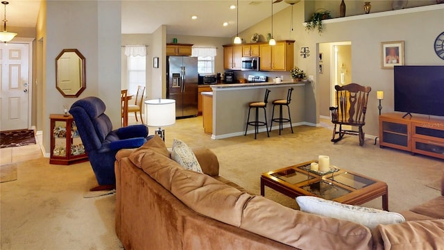 73 Royal Oak Dr, Palm Coast, FL 32164 - living room featuring baseboards, high vaulted ceiling, recessed lighting, and light colored carpet