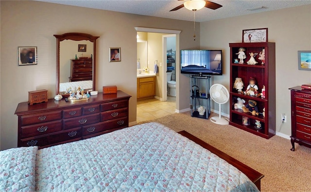 73 Royal Oak Dr, Palm Coast, FL 32164 - bedroom featuring a sink, a textured ceiling, ensuite bath, light colored carpet, and visible vents
