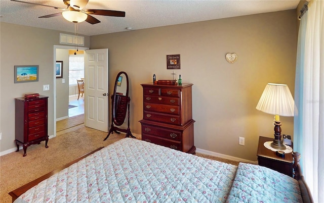 73 Royal Oak Dr, Palm Coast, FL 32164 - bedroom with baseboards, visible vents, carpet flooring, and a textured ceiling