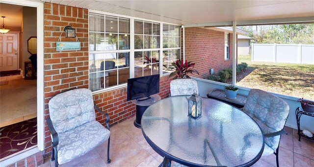 73 Royal Oak Dr, Palm Coast, FL 32164 - view of patio featuring outdoor dining area and fence