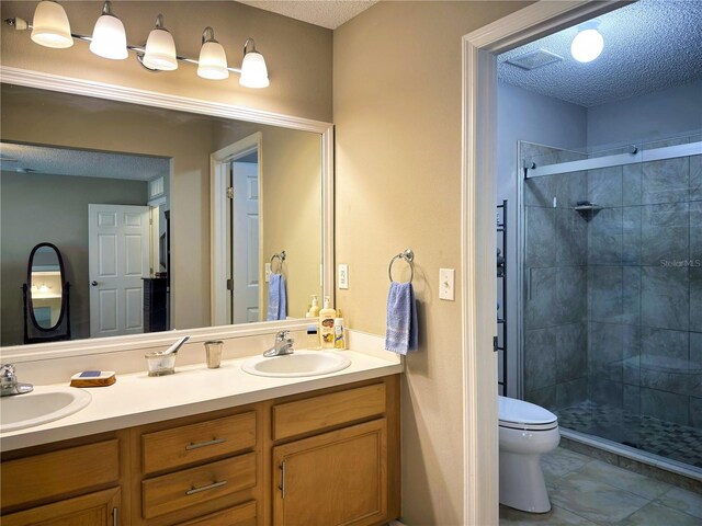 73 Royal Oak Dr, Palm Coast, FL 32164 - full bath with a sink, a textured ceiling, and a shower stall