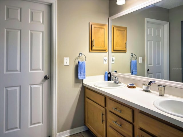 73 Royal Oak Dr, Palm Coast, FL 32164 - bathroom with double vanity and a sink