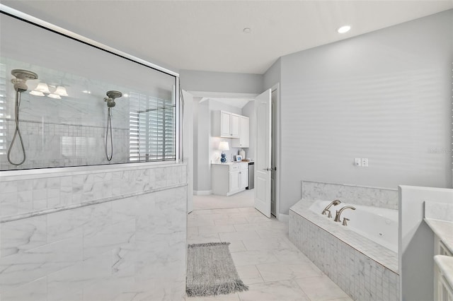 46 Ocean Ridge Blvd N, Palm Coast, FL 32137 - full bathroom with a tub with jets, tiled shower, and marble look tiles