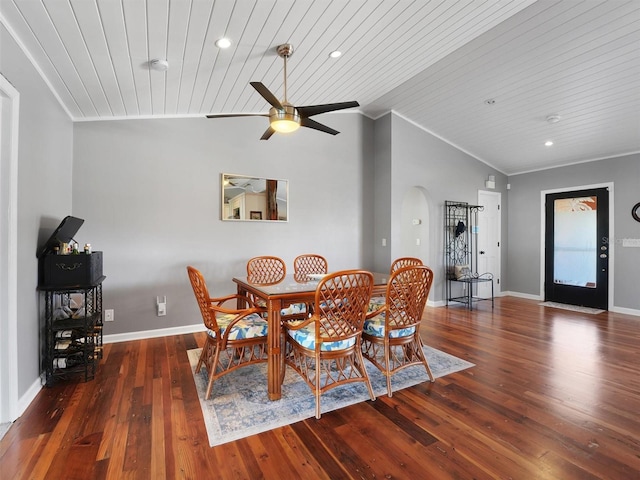 dining space with wooden ceiling, arched walkways, vaulted ceiling, and hardwood / wood-style floors