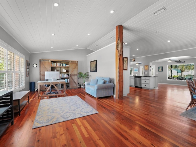 living room with a ceiling fan, wooden ceiling, wood finished floors, vaulted ceiling, and ornamental molding