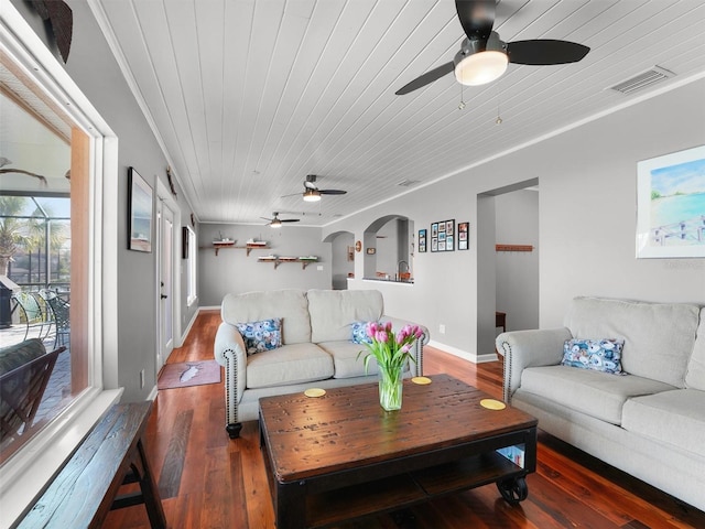living area featuring ceiling fan, visible vents, wood ceiling, and wood finished floors