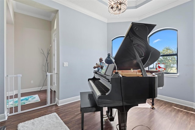 7 Menorca Way, Palm Coast, FL 32137 - sitting room with baseboards, crown molding, wood finished floors, and a chandelier
