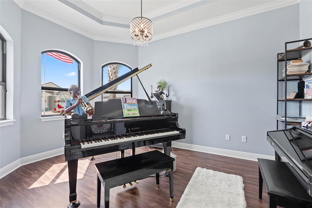 7 Menorca Way, Palm Coast, FL 32137 - sitting room with crown molding, wood finished floors, a raised ceiling, baseboards, and a notable chandelier